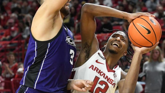Razorbacks' Tramon Mark drives inside against Abilene Christian